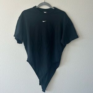 Trendy Nike sports body suit size L black